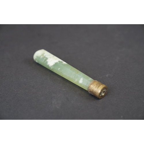 293 - A oriental Jade double ended roller with brass mounts together with a Jade handle.