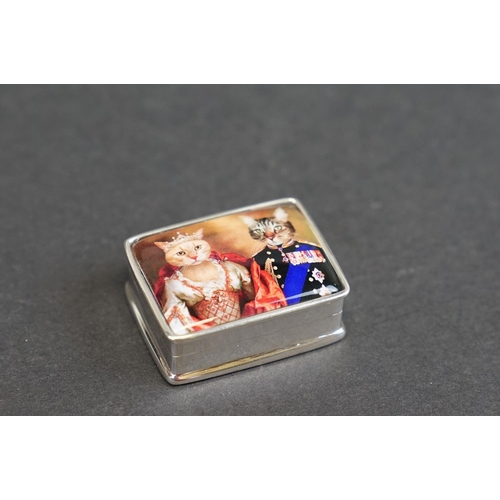 297 - Silver and enamel pillbox depicting Royal Cats, stamped Sterling