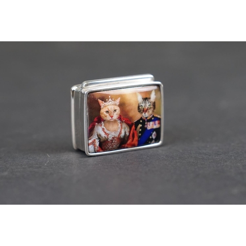 297 - Silver and enamel pillbox depicting Royal Cats, stamped Sterling