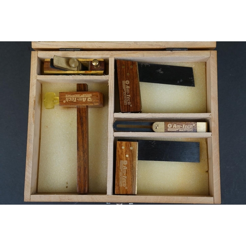 307 - A cased set of AM-Tech miniature wood working tools to include wood plane and set squares.