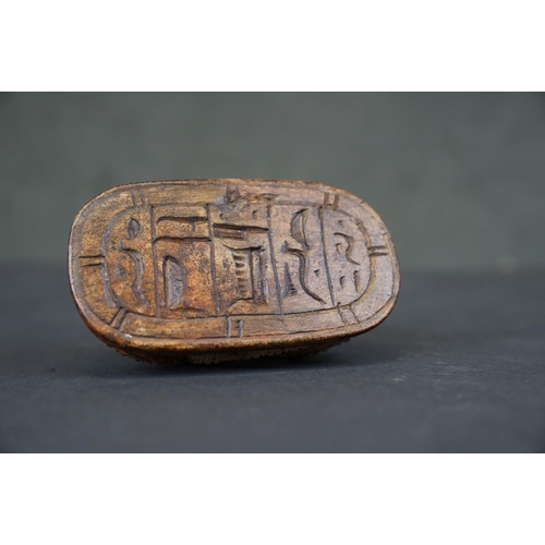 309 - A carved stone Egyptian ornament of a scarab beetle.