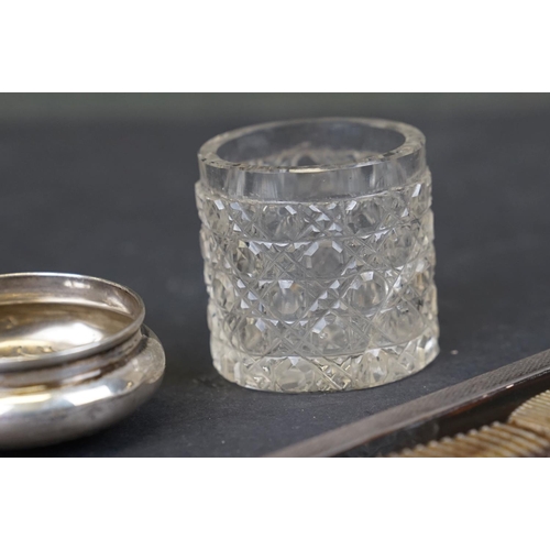 310 - A collection of hallmarked sterling silver items to include a silver topped glass jar featuring Reyn... 