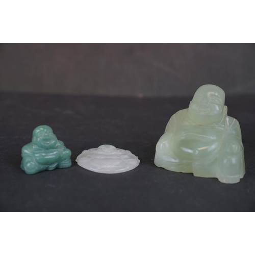 317 - Two carved Jade Buddha figures together with a carved Jade Buddha amulet.