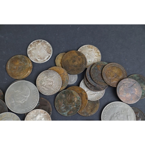 318 - A small collection of mainly British pre-decimal coins together with some American half dollar coins