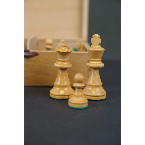 323 - Carved wooden chess set