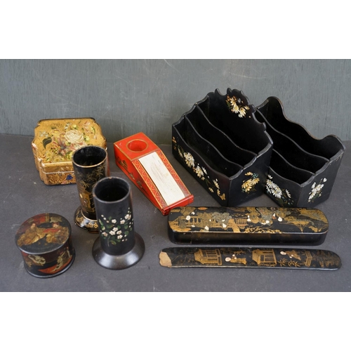 325 - A collection of Japanese lacquer ware to include letter racks, pen holders and a pencil box.