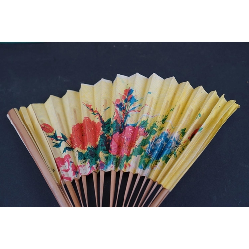 326 - A collection of vintage fans together with a oriental parasol.