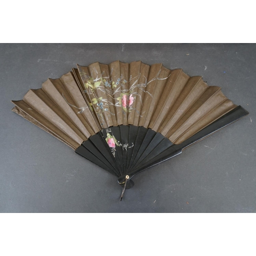 326 - A collection of vintage fans together with a oriental parasol.