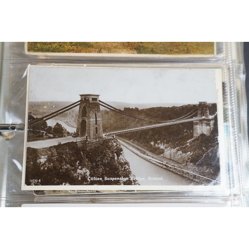 335 - A large collection of vintage postcards, mainly topographical together with a quantity of mixed stam... 