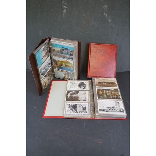 335 - A large collection of vintage postcards, mainly topographical together with a quantity of mixed stam... 