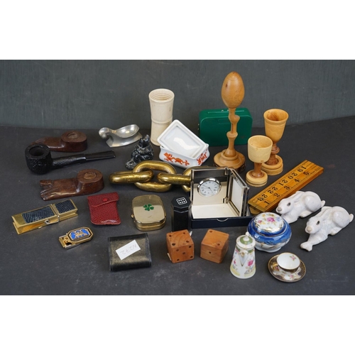 337 - A box of mixed collectables to include a carved bone dice shaker, an estate pipe and a collection of... 