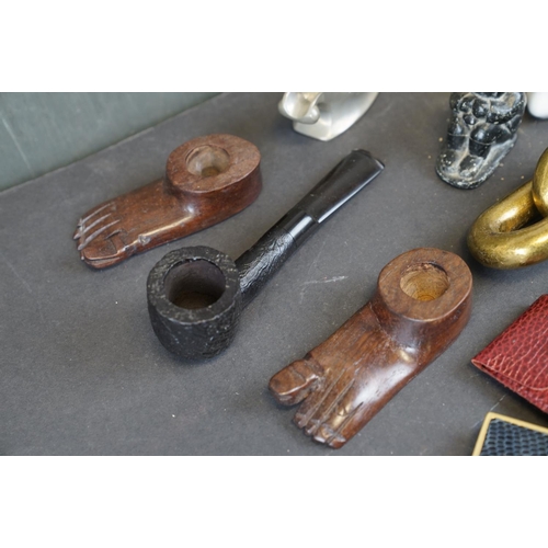 337 - A box of mixed collectables to include a carved bone dice shaker, an estate pipe and a collection of... 