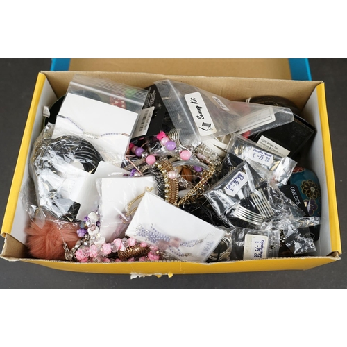 344 - A collection of mainly contemporary costume jewellery contained within four boxes.