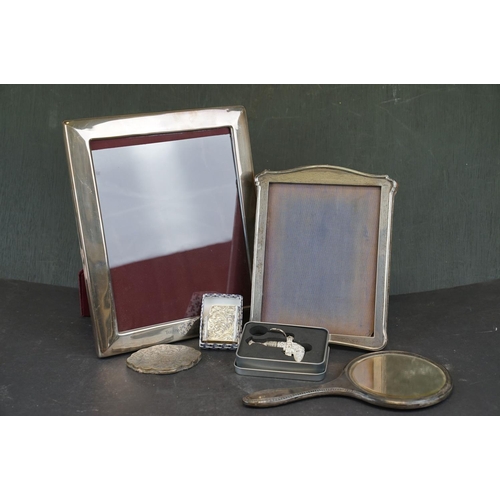 349 - Two sterling silver photograph frames together with a 925 sterling silver lighter case.