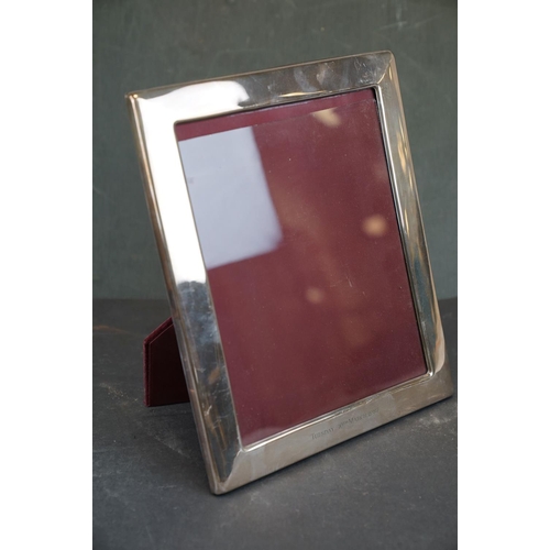 349 - Two sterling silver photograph frames together with a 925 sterling silver lighter case.