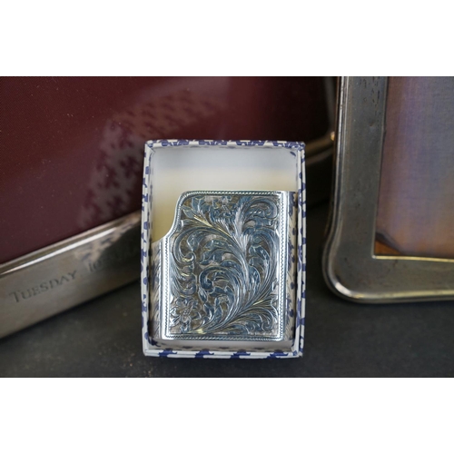 349 - Two sterling silver photograph frames together with a 925 sterling silver lighter case.