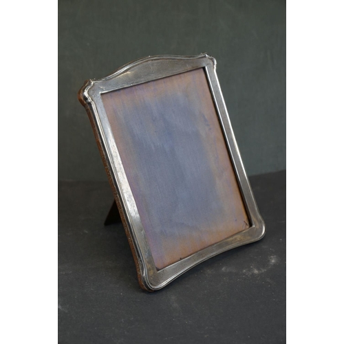 349 - Two sterling silver photograph frames together with a 925 sterling silver lighter case.