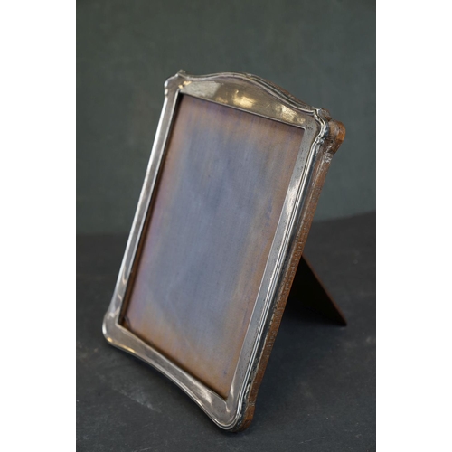 349 - Two sterling silver photograph frames together with a 925 sterling silver lighter case.