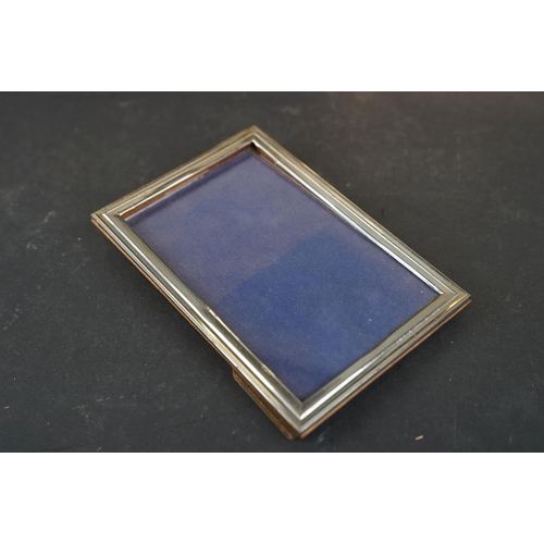 354 - A collection of hallmarked sterling silver photograph frames together with a hallmarked sterling sil... 