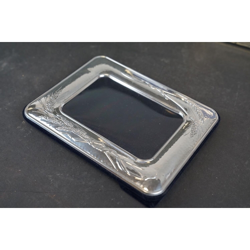 354 - A collection of hallmarked sterling silver photograph frames together with a hallmarked sterling sil... 