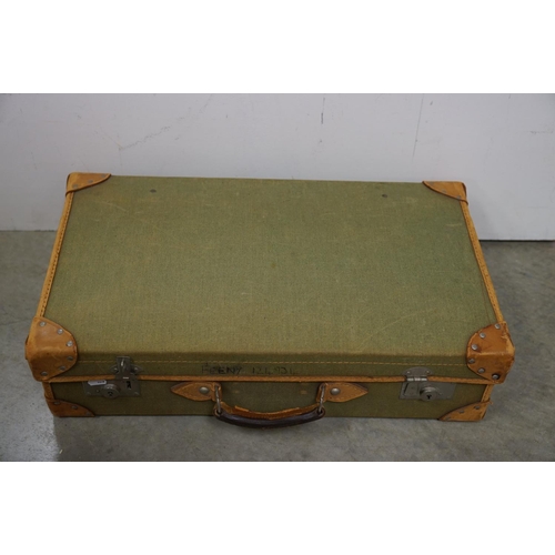 449 - Four vintage suitcases, to include demob example, others with travel stickers attached