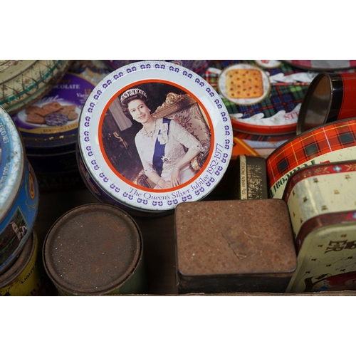 453 - A collection of vintage advertising tins to include biscuit, chocolate and tobacco examples.