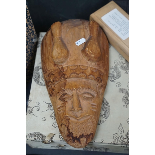 456 - A group of oriental collectables to include a fan and a carved wooden mask