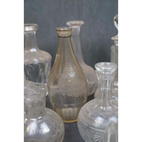 461 - A collection of eight glass spirit decanters.