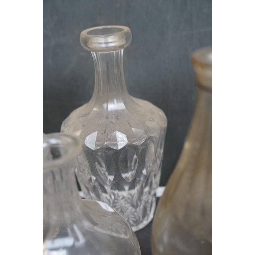 461 - A collection of eight glass spirit decanters.