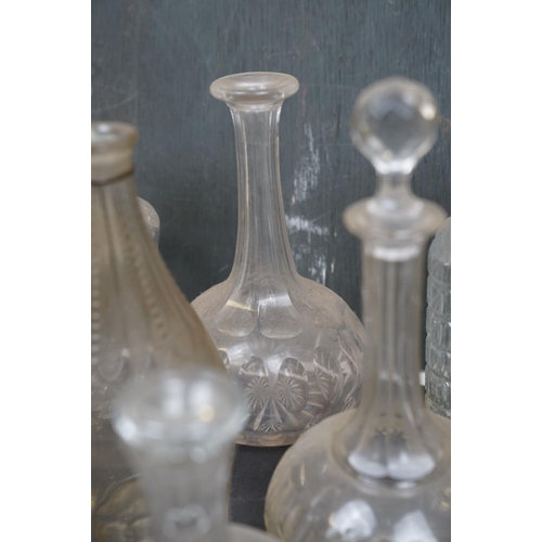 461 - A collection of eight glass spirit decanters.