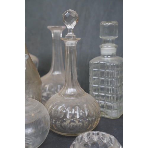 461 - A collection of eight glass spirit decanters.