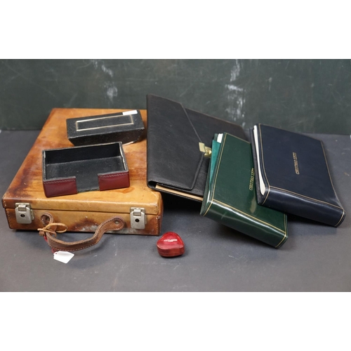 495 - A collection of leather collectables to include a vintage brief case, leather bound memo book, leath... 