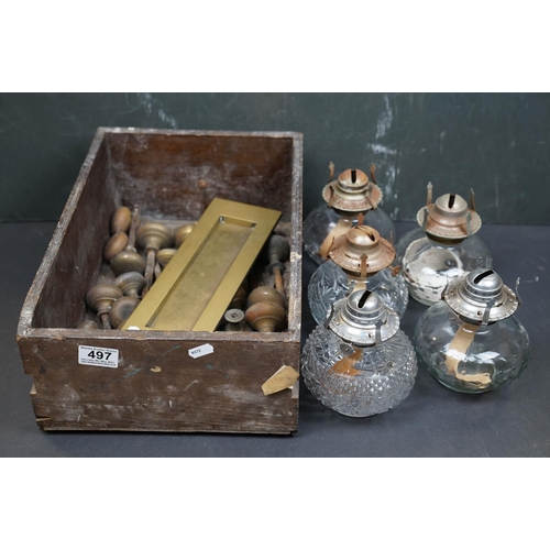 497 - A collection of brass door furniture to include door knobs and a letter box cover together with five... 