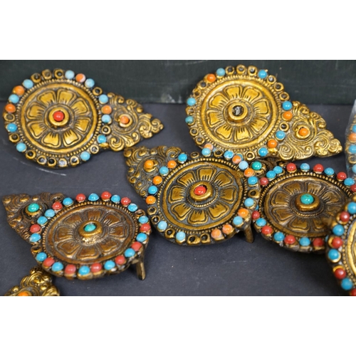 498 - A group of decorative brass collectables, possibly polynesian.