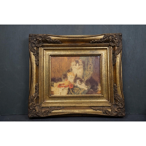 500 - A quantity of contemporary oil paintings and cat prints mounted in antique style frames.