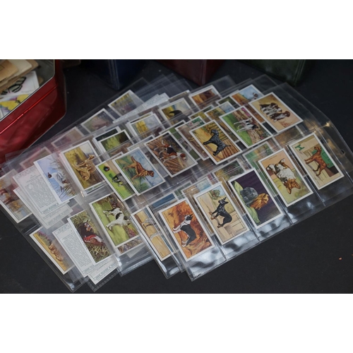 501 - A large quantity of vintage cigarette cards covering various subjects to include Will's and Player's... 