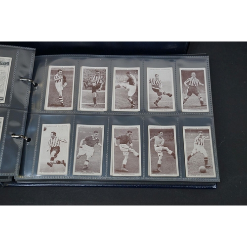 501 - A large quantity of vintage cigarette cards covering various subjects to include Will's and Player's... 