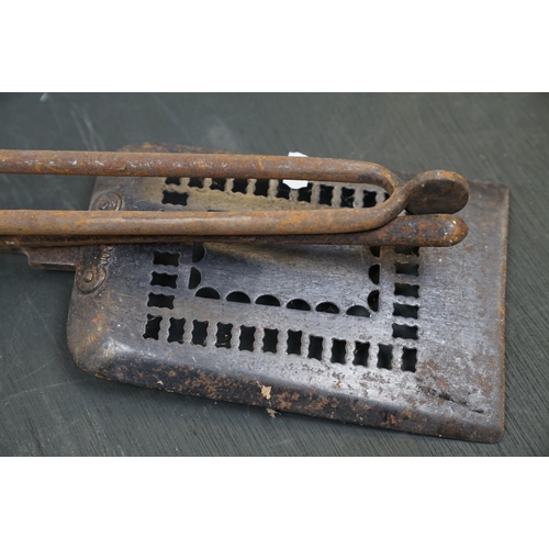 505 - A vintage iron three piece fire tool companion set comprising of shovel, poker and tongs.