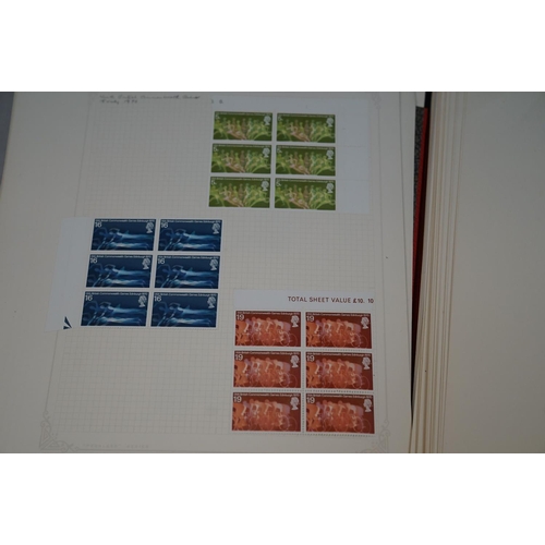 509 - A large collection of world and GB stamps contained within nine albums to include many mint examples... 