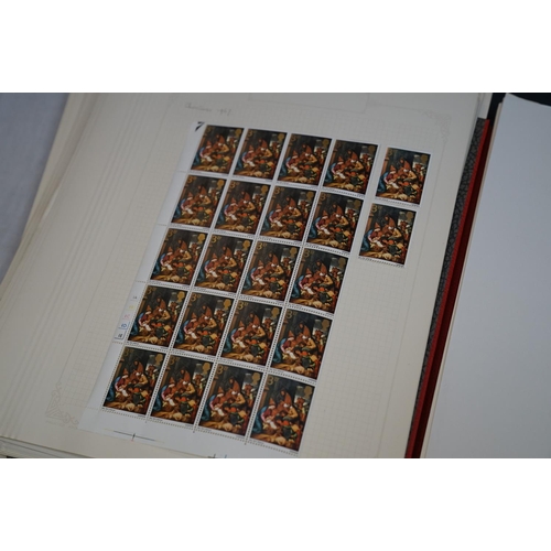 509 - A large collection of world and GB stamps contained within nine albums to include many mint examples... 