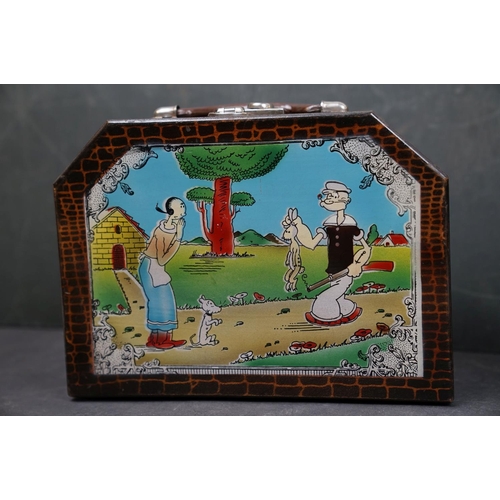 527 - A small collection of vintage toys to include a Steiff rabbit and a Popeye lunchbox.