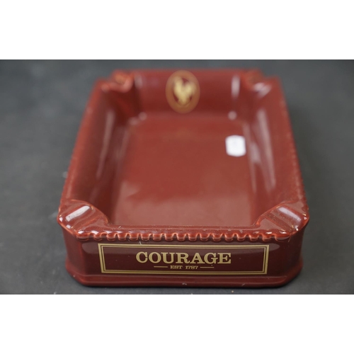 530 - Pub advertising ashtrays to include Smirnoff and Courage