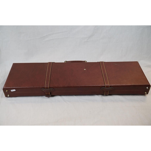 533 - A Di Lucchini Arm Italia brown leather shotgun case.