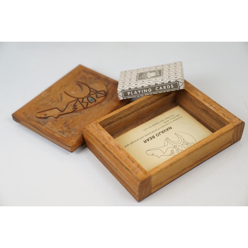 538 - A box of mixed collectables to include a carved wooden Navajo card box and a quantity of ephemera to... 