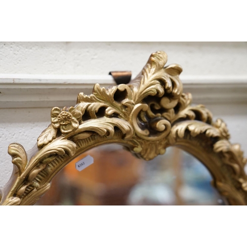 655 - 20th century Rococo style Gilt Oval Mirror, 67cms high