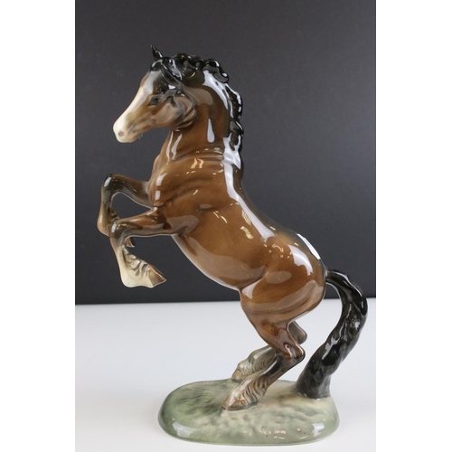 118 - Beswick Brown Shire Mare, model 818 together with Beswick Brown Mare facing left, model 976 and Besw... 