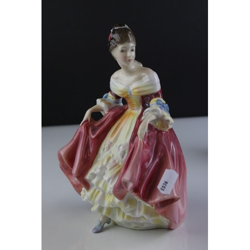 121 - Five Royal Doulton Figurines including Top o' the Hill, Fair Lady (red), Christmas Morn, Southern Be... 