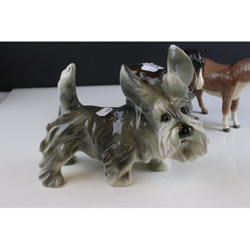 125 - Beswick Woolly Shetland Mare, model 1033, Beswick Donkey and a Ceramic Dog