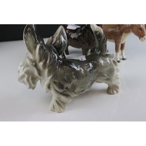 125 - Beswick Woolly Shetland Mare, model 1033, Beswick Donkey and a Ceramic Dog