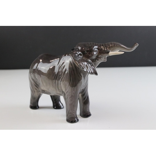 136 - Beswick Small Elephant, trunk stretching, model 974